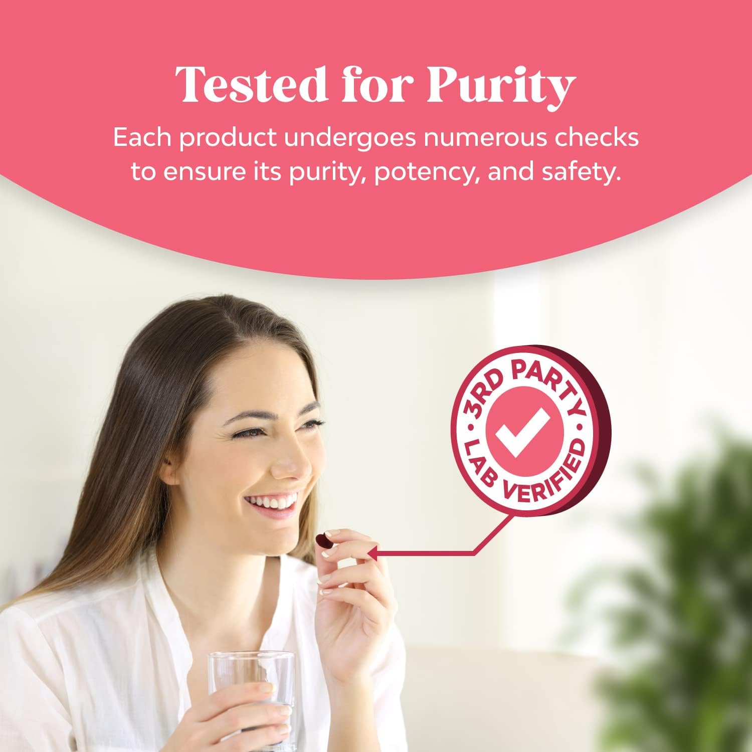 Woman taking a Natures Craft gummy for daily wellness.