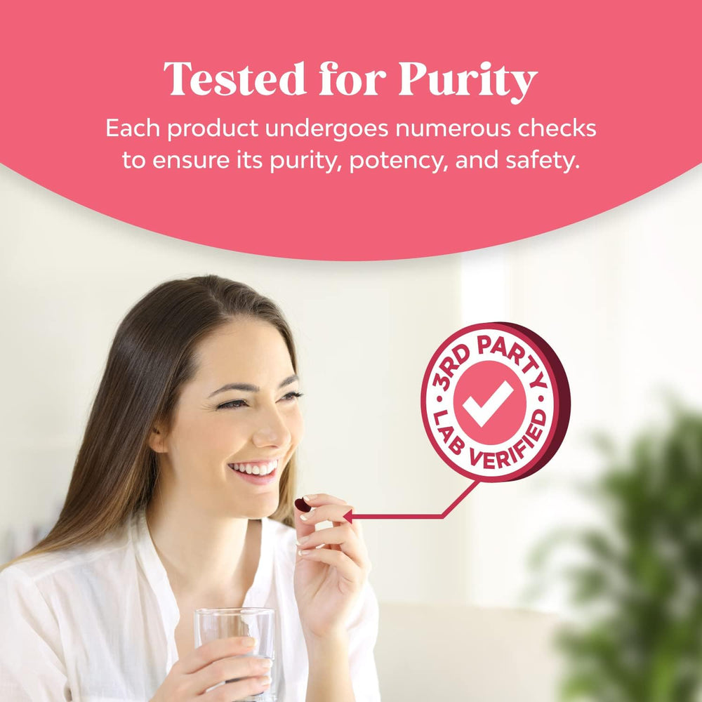 Woman taking a Natures Craft gummy for daily wellness.