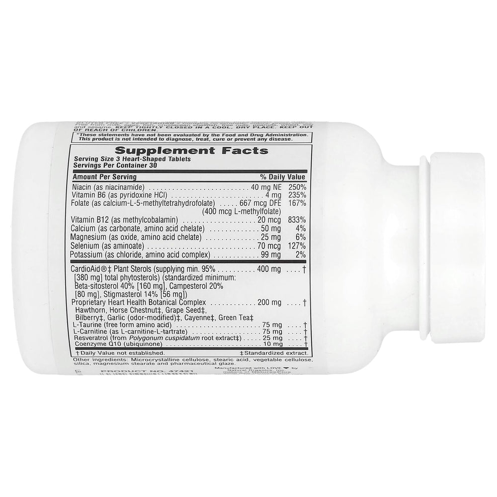 Close-up of Heartbeat tablets highlighting vegan formulation and gluten-free ingredients.