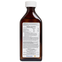 Pouring NaturesPlus Hema-Plex liquid iron into a glass for convenient intake