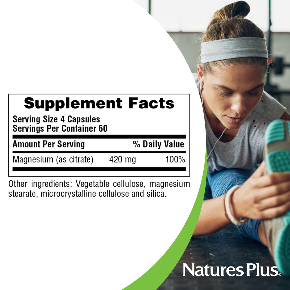 NaturesPlus KalmAssure serving spoon with capsules for easy daily intake.