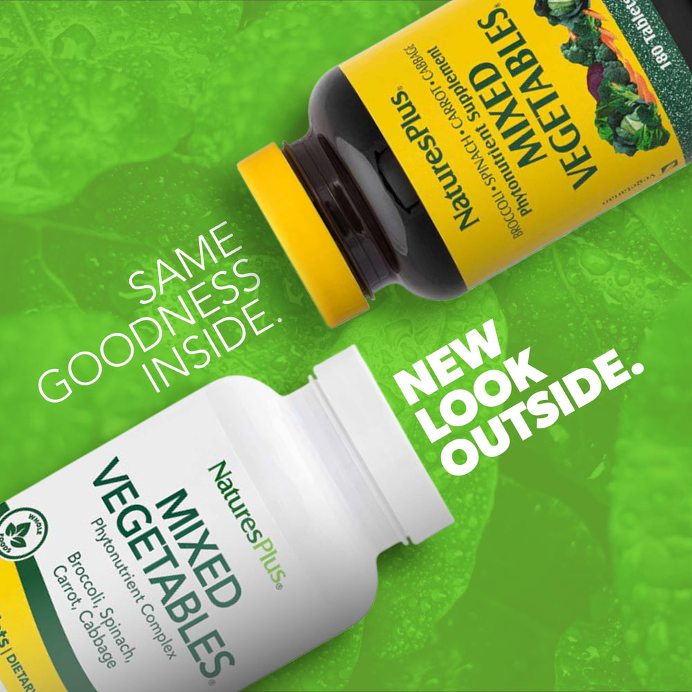 Closeup of NaturesPlus tablets highlighting vegetarian capsules for convenient daily greens