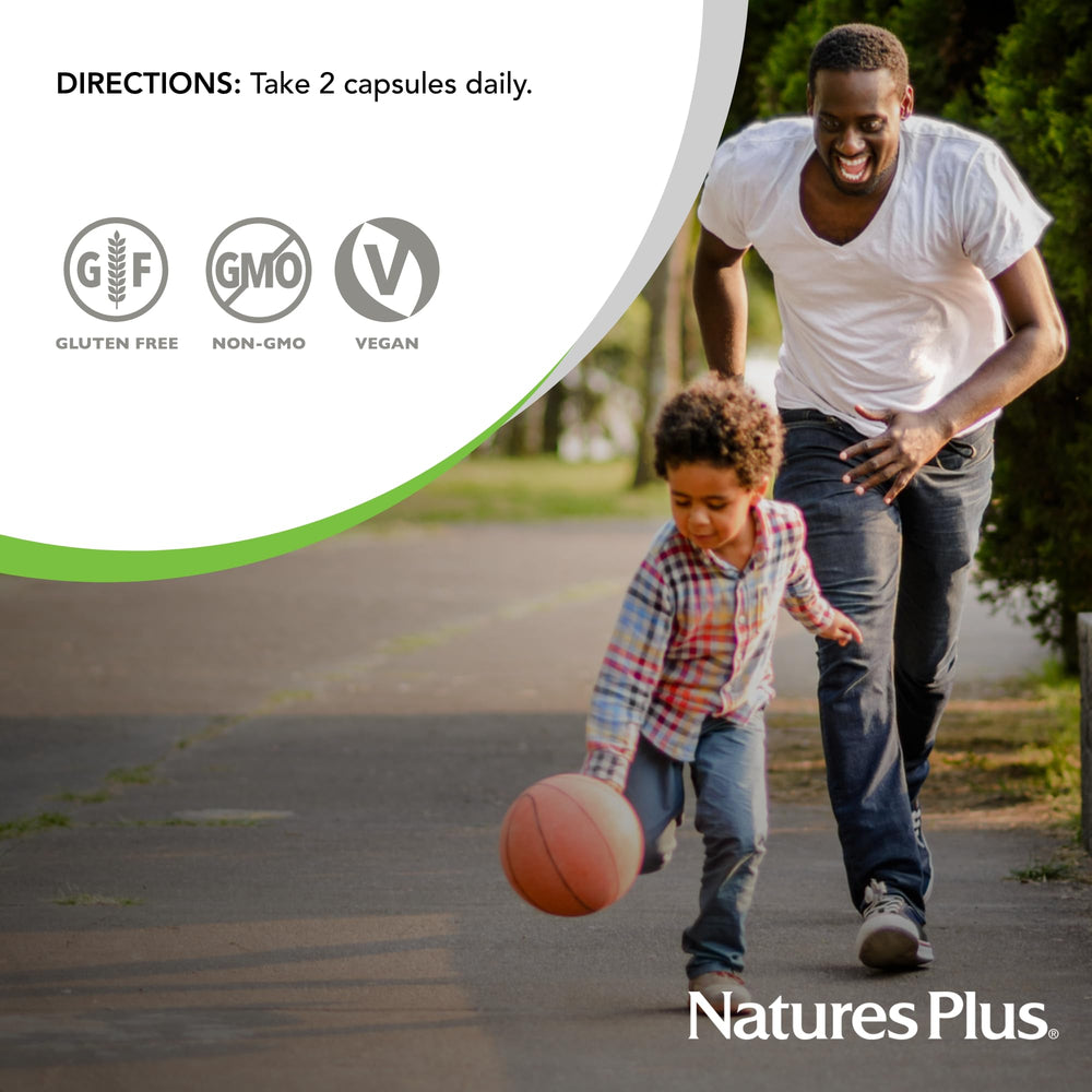 A person taking NaturesPlus Cranberry 500 mg capsules as part of daily routine.