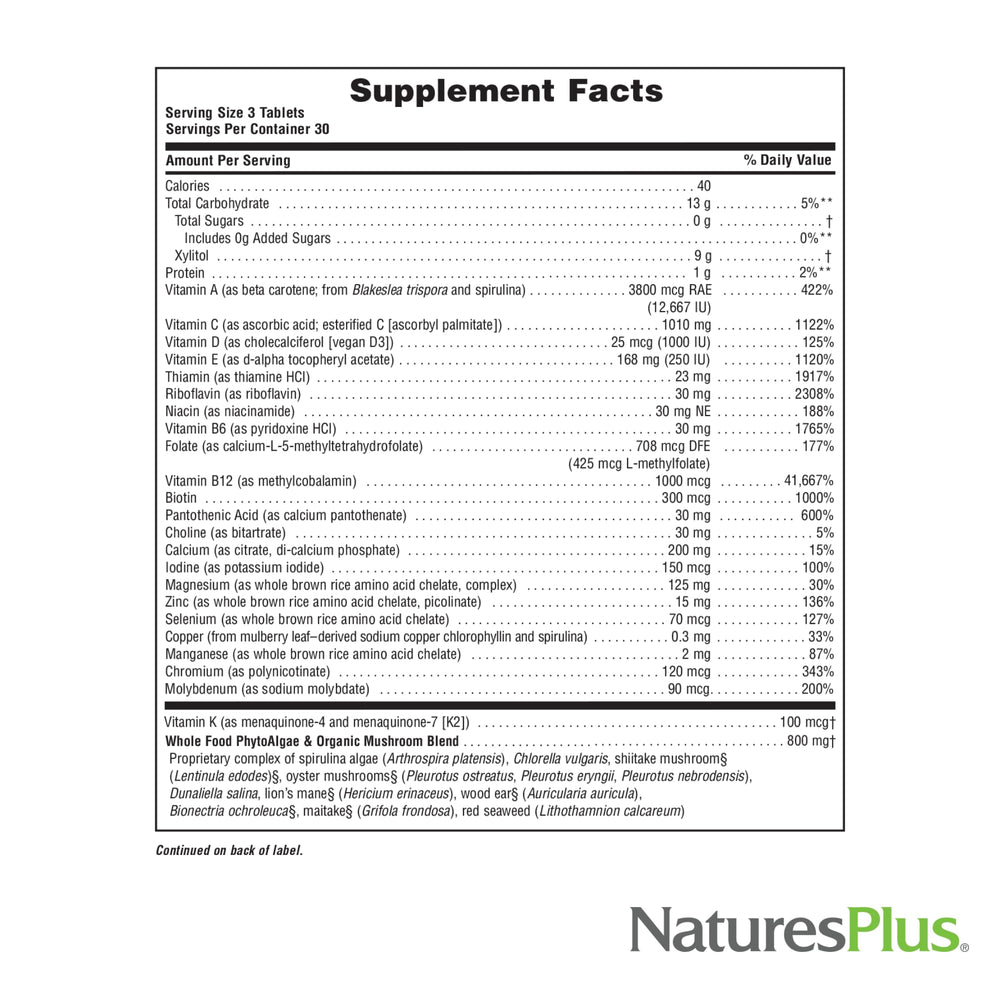 NaturesPlus Source of Life Gold chewables next to a glass of water for easy daily intake