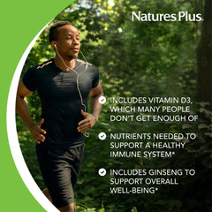 NaturesPlus Source of Life Liquid tropical fruit glass bottle setup signals premium multivitamin.