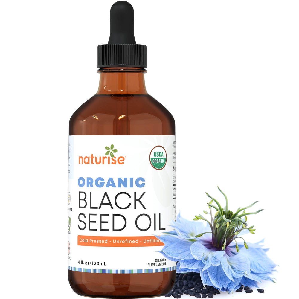 Naturise oil applied to nails and hair for gentle care.