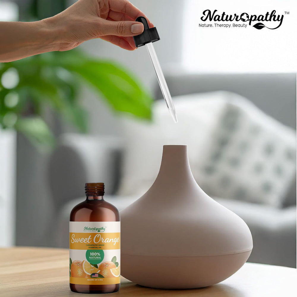 Packaging display of NATUROPATHY Sweet Orange Oil in 4 oz size