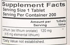 NCI Advanced Research Lithium Orotate 120 Mg tablets close-up showing tablet texture and packaging.