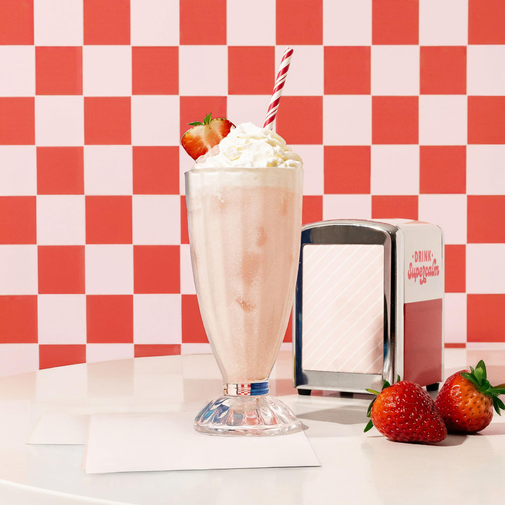 Nello vitamin D3 bottle close-up tied to daily wellness routine.