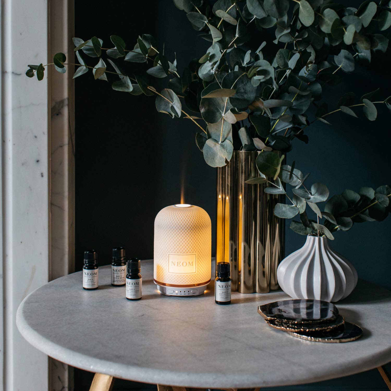NEOM diffuser mist aroma fills a room with relaxing lavender and jasmine.