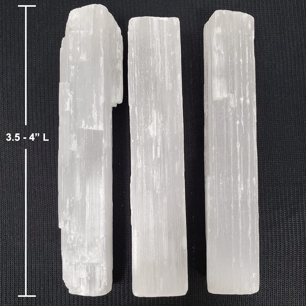 New Age Imports selenite sticks arranged in a grid for meditation and focus