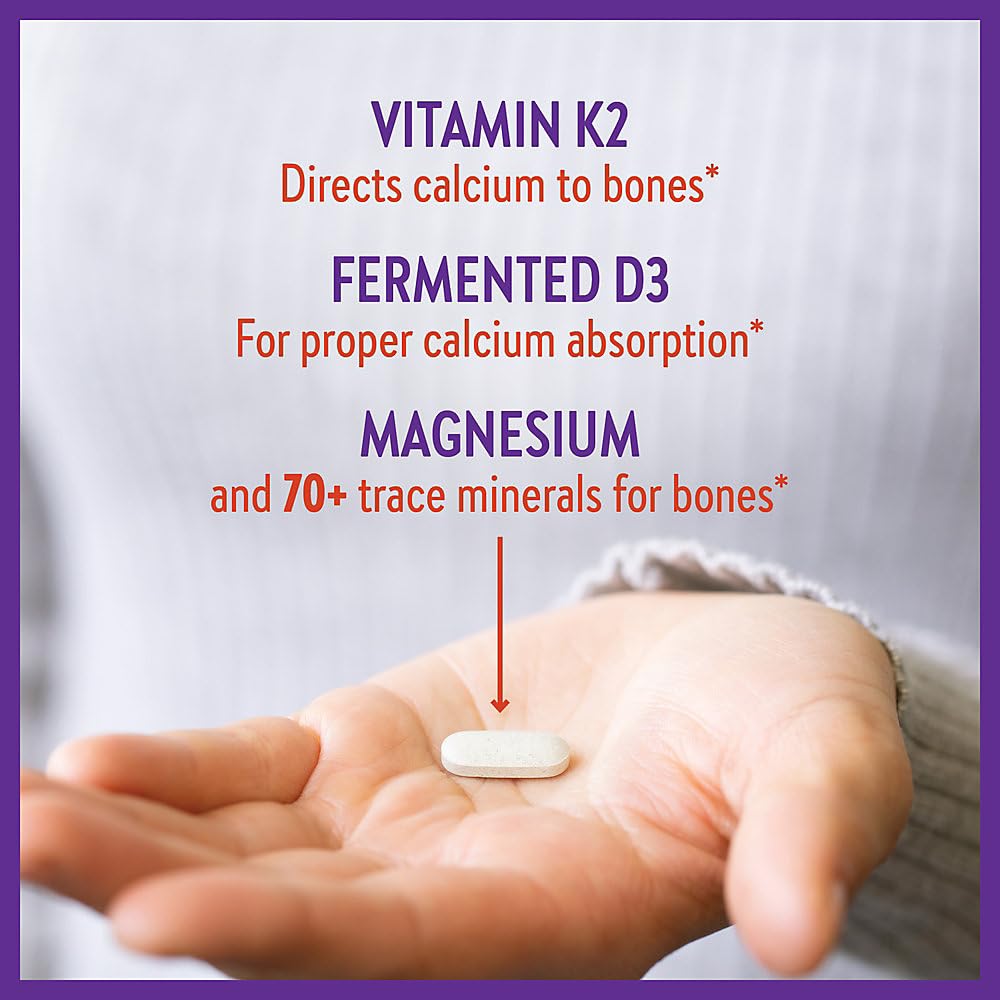New Chapter Calcium bottle with glass and calendar suggests daily routine
