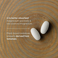 Product on a softly lit bed setup suggesting sleep support.