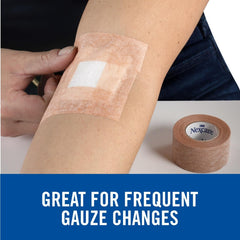 Nexcare Gentle Paper Tan Tape on skin, conforming to fingers and wrists.