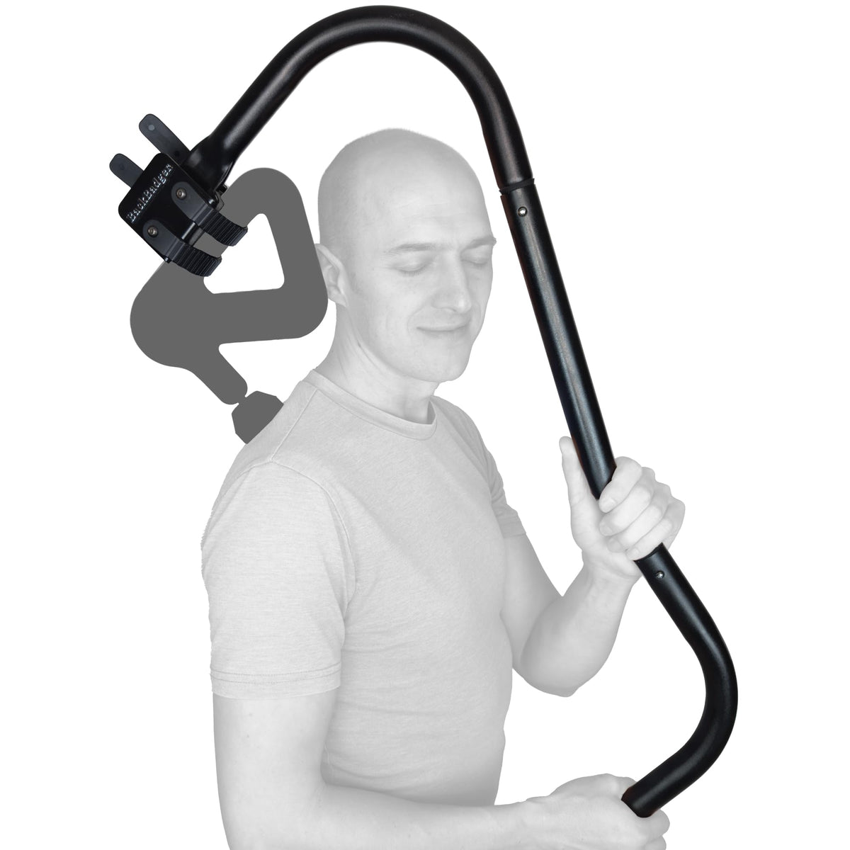 Ninefold Design BackBadger holster strap secures the massage gun during back sessions.