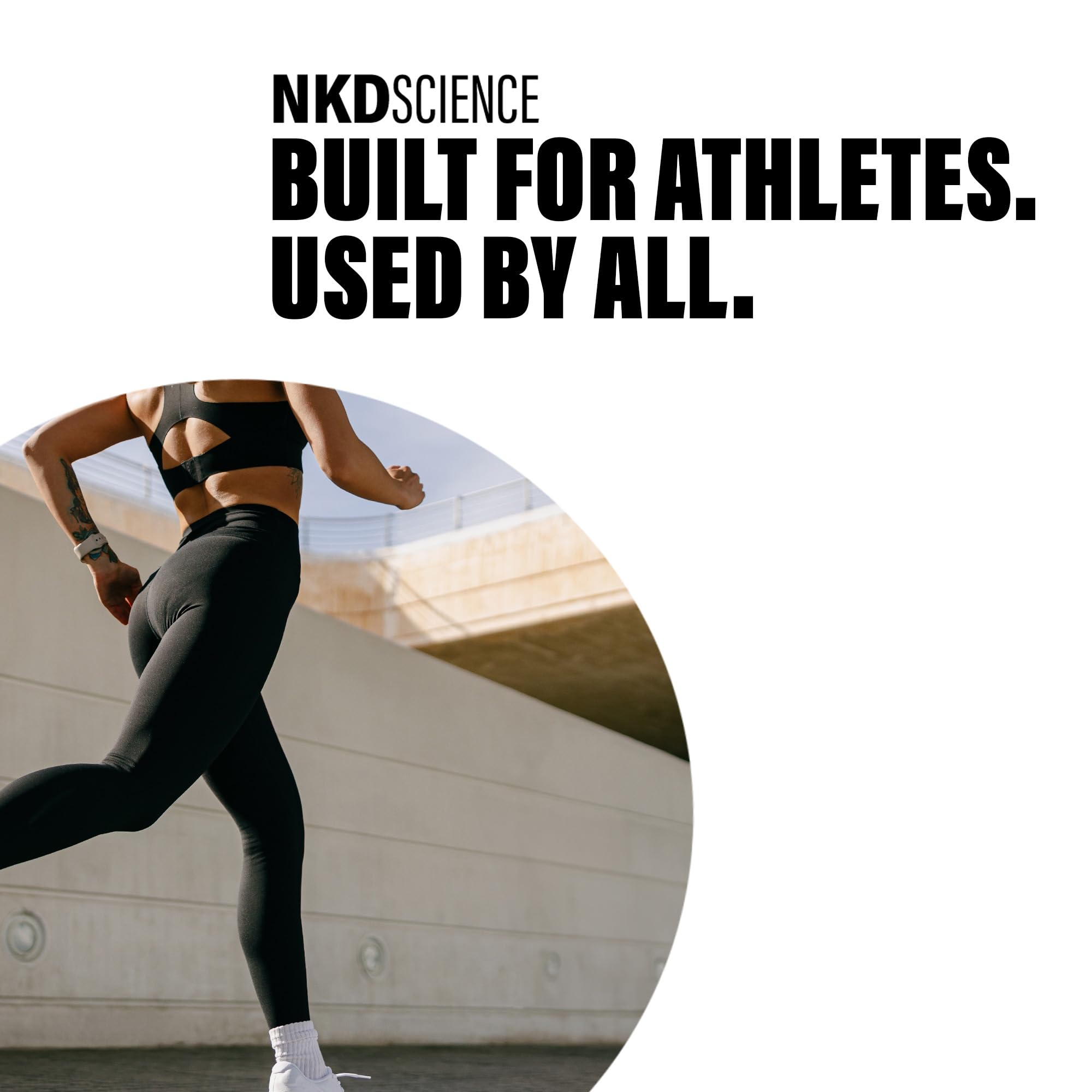 NKDScience Creatine Monohydrate powder bottle on a shelf in a gym setting