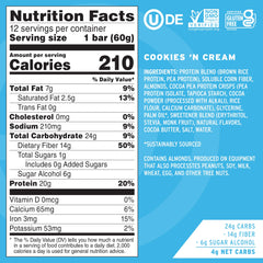 No Cow Upgraded Cookies N Cream bar close-up with crunchy cookie pieces and creamy center