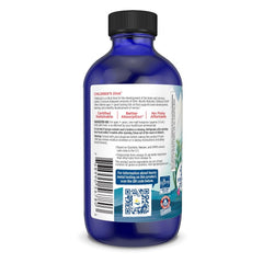 Nordic Naturals Children's DHA strawberry label emphasizes purity and non-GMO ingredients.