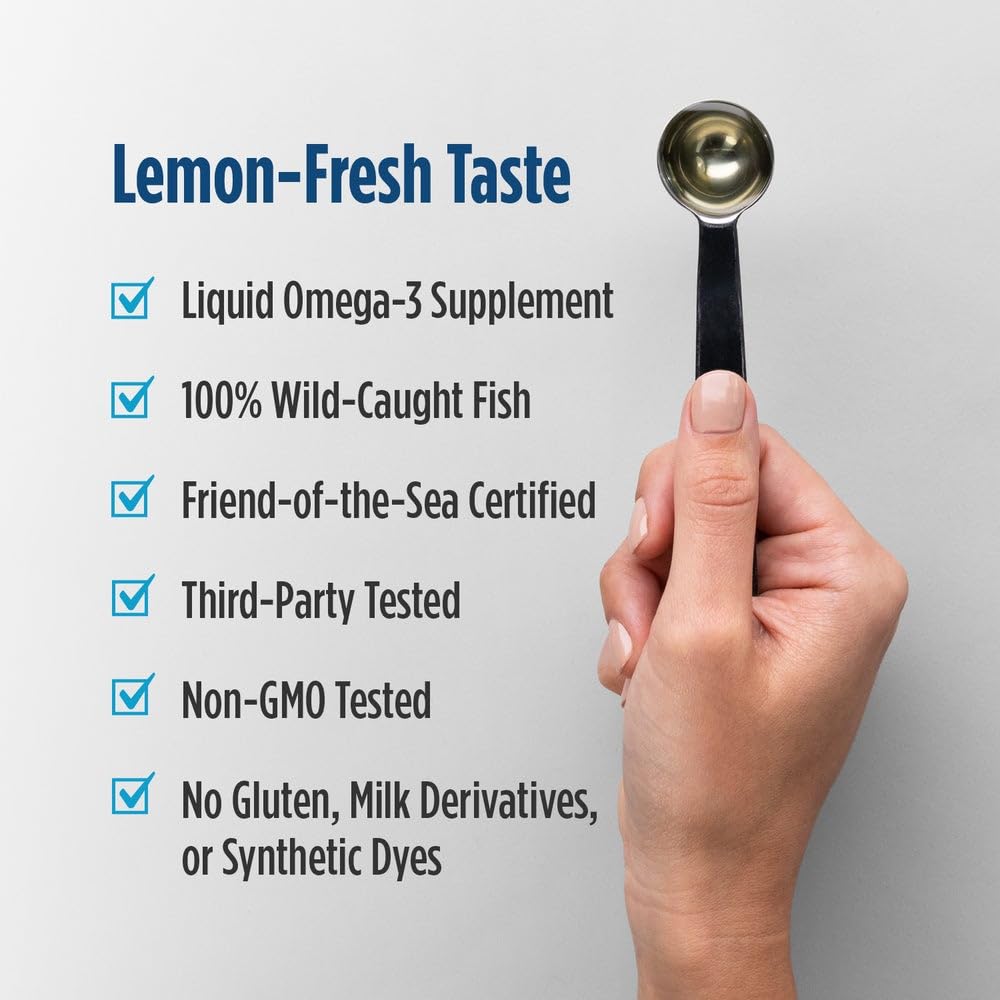Measuring spoon with Nordic Naturals Ultimate Omega Xtra Liquid Lemon for accurate serving.