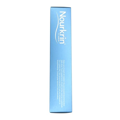 Nourkrin Woman capsules in hand for easy, drug-free hair support.