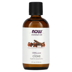 NOW Foods Clove Oil label close-up showing purity details.