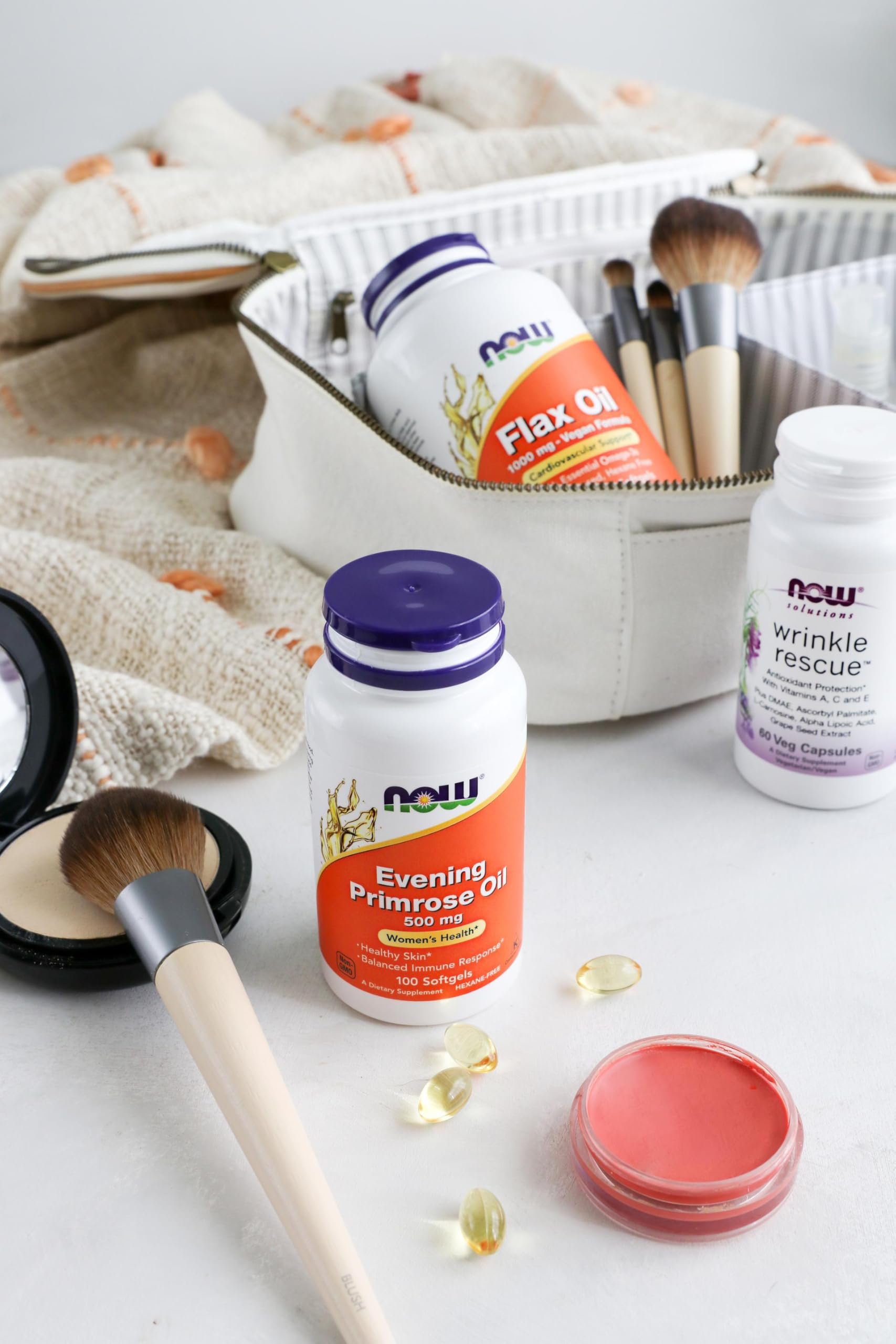 NOW Foods Evening Primrose Oil softgels being poured for convenient daily dosing.