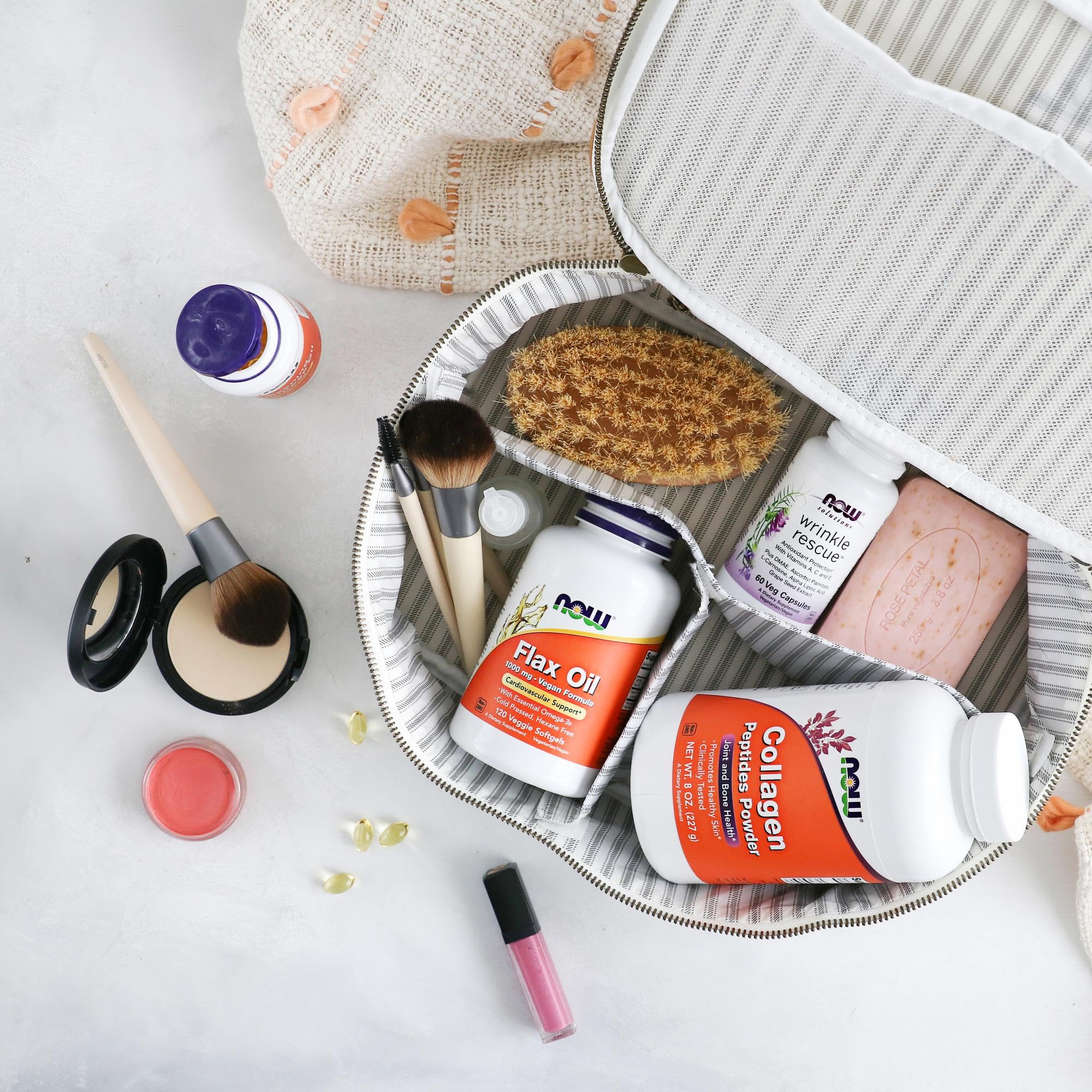 NOW Foods Flax Oil softgels close-up highlights freshness and oil protection.