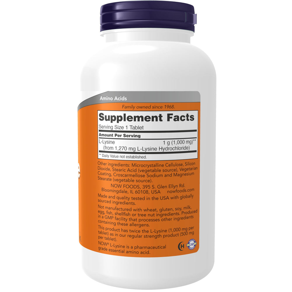 NOW Foods Lysine HCL tablets closeup highlighting 1000 mg dosage for protein formation support.
