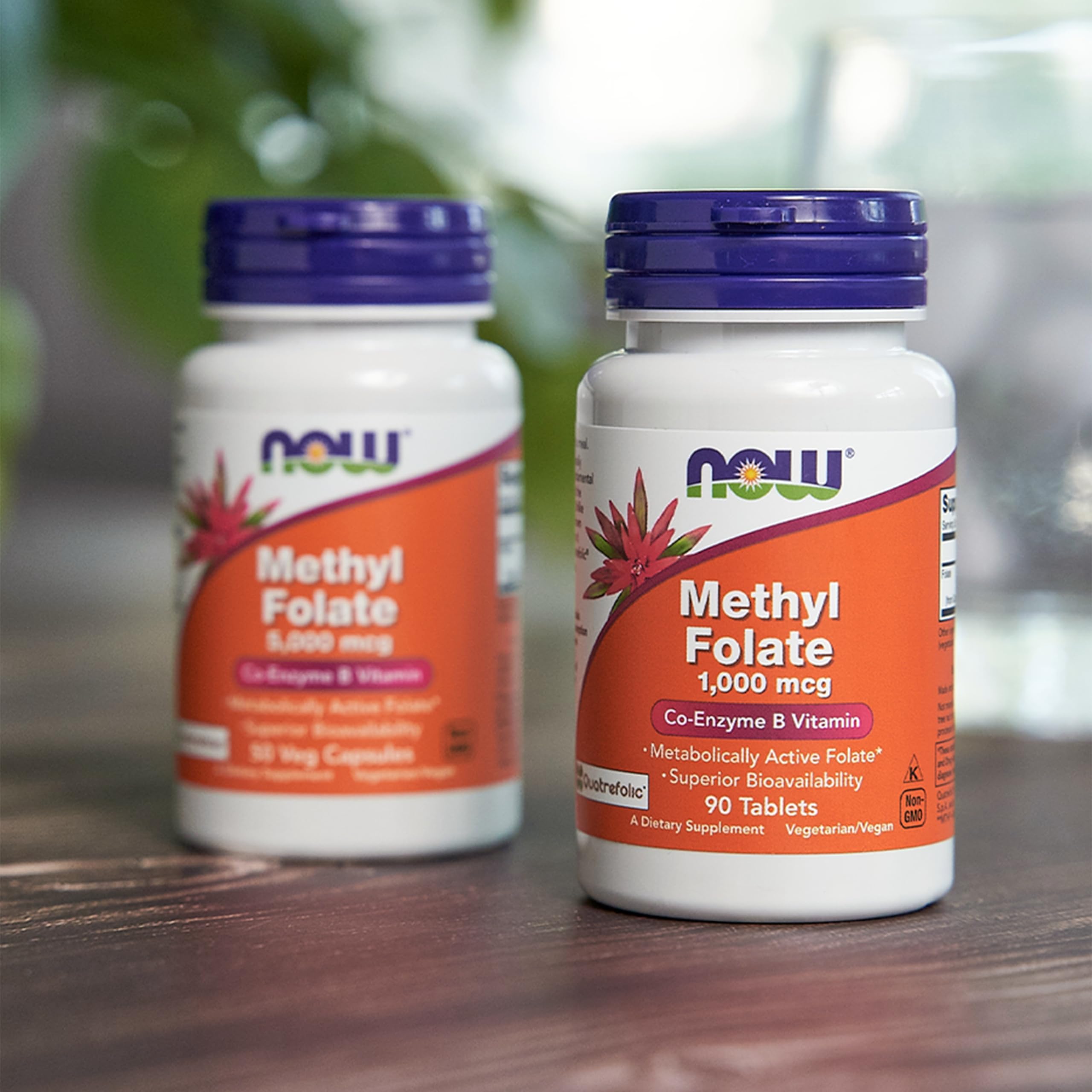 NOW Foods Methyl Folate 5000 mcg capsules in hand for portability.