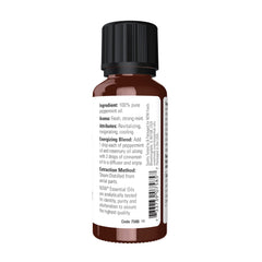 NOW Foods peppermint oil bottle closeup highlighting purity