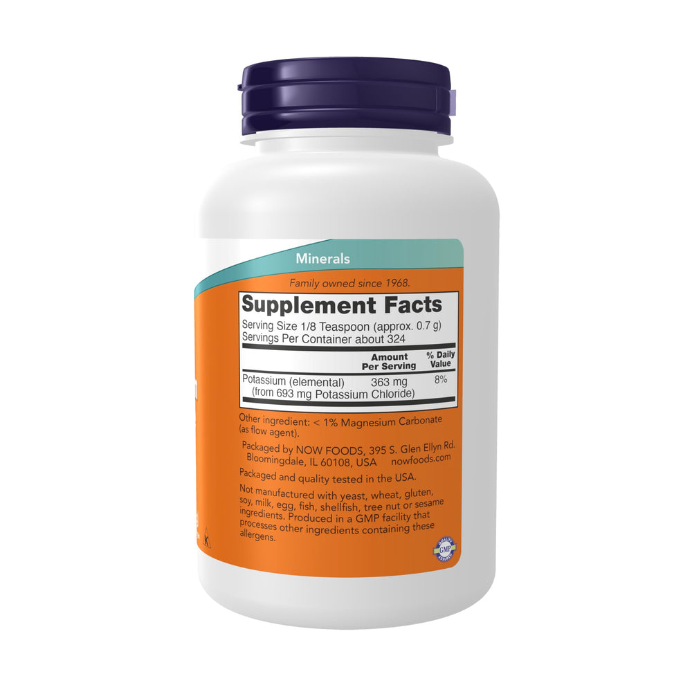 Measuring scoop with NOW Foods potassium chloride powder for precise dosing