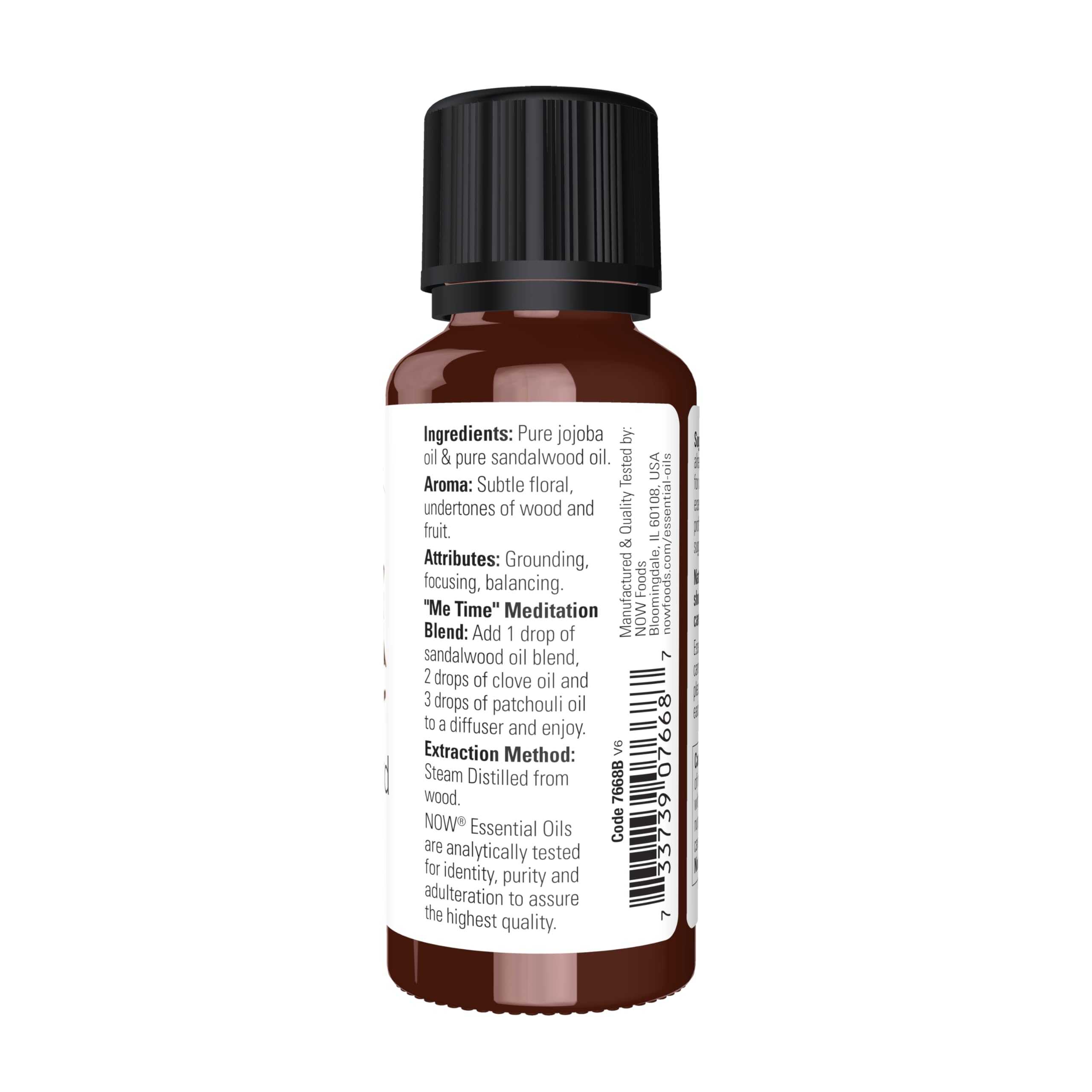 NOW Foods sandalwood oil jojoba base bottle closeup shows carrier oil.
