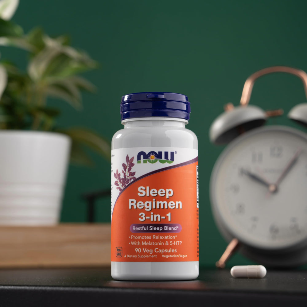 NOW Foods Sleep Regimen capsules poured into hand for easy dosing