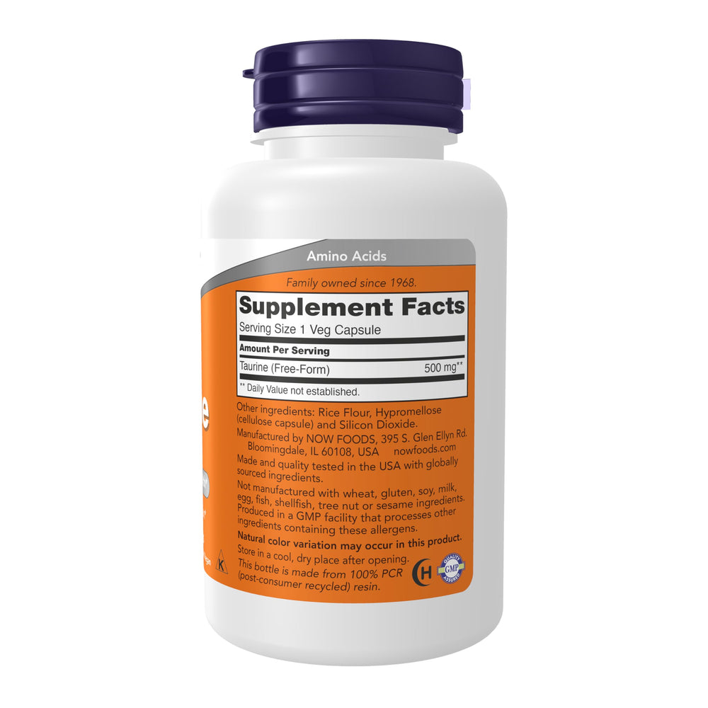 NOW Foods Taurine 500 mg tablet closeup showing capsule texture and potency.