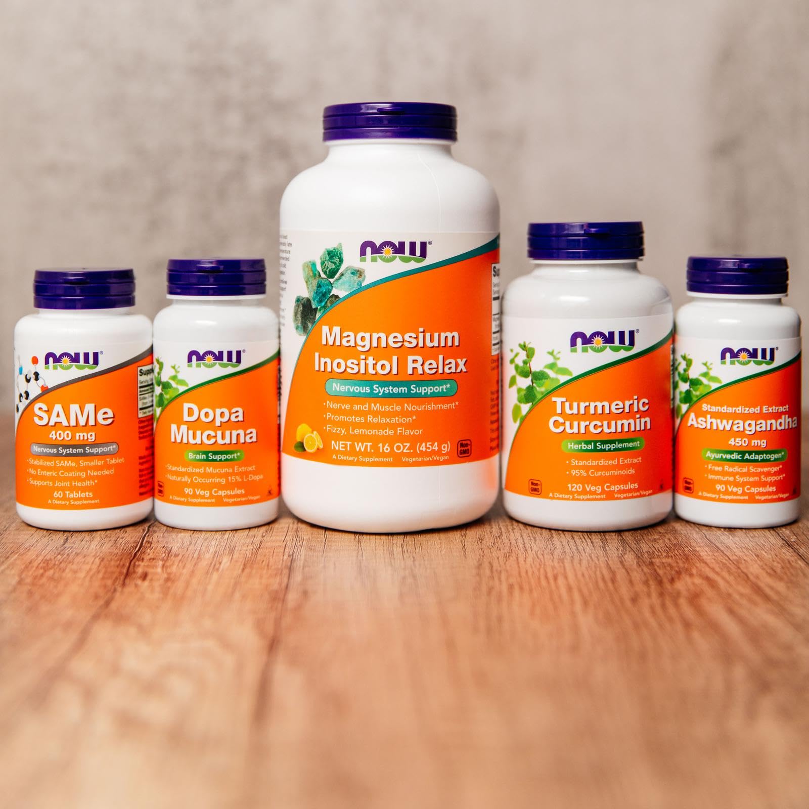 NOW Foods Turmeric Curcumin capsules close-up showing vibrant color and dosage