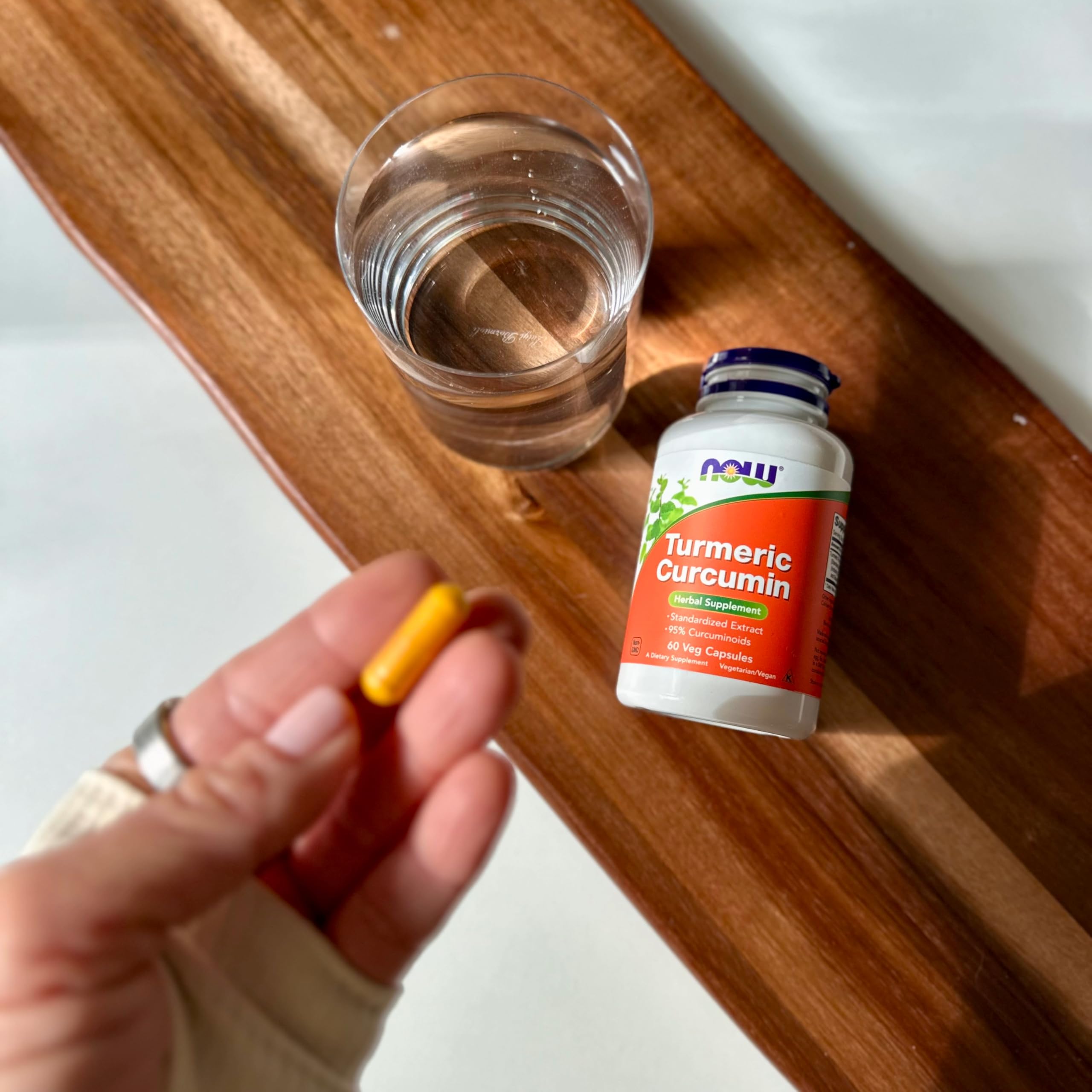 NOW Foods Turmeric Curcumin capsules ingredient list indicating turmeric root extract