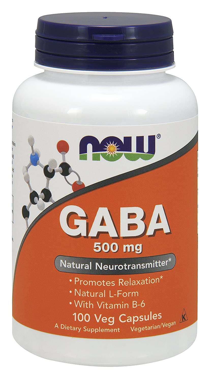 NOW GABA 500mg capsules close-up showing capsule texture and consistency.