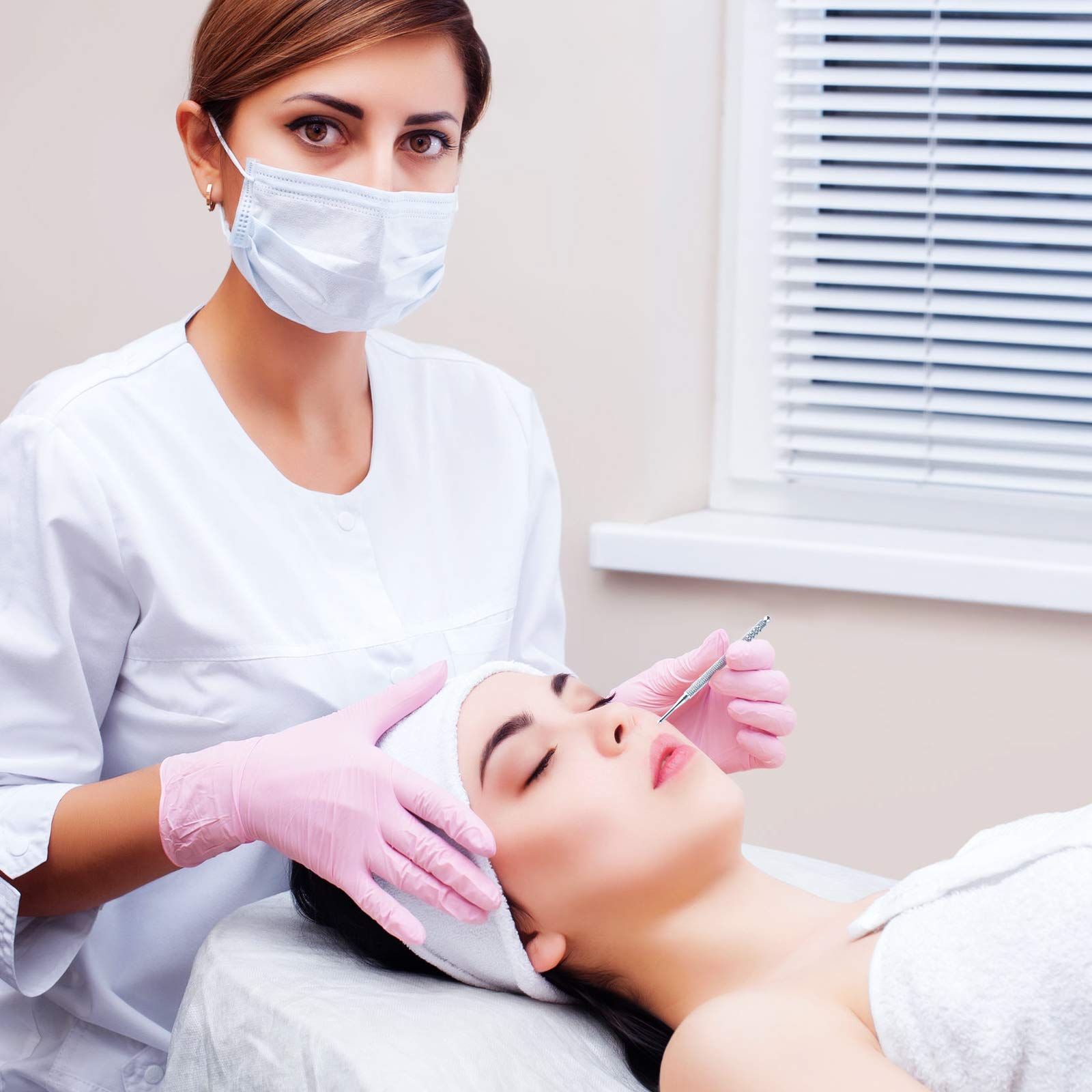 Nuanchu ear point probe designed for precise ear reflexology applications.