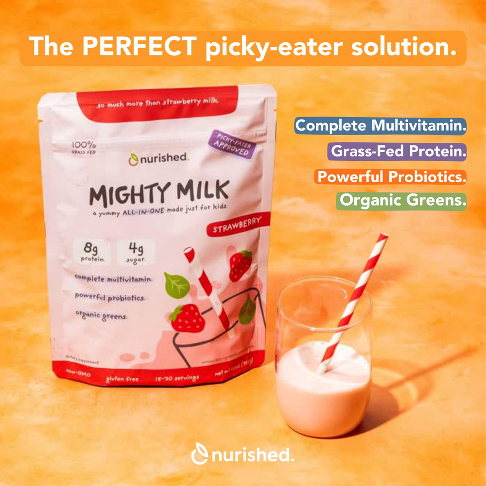 Nurished Mighty Strawberry Milk shaken in a bottle to blend real ingredients