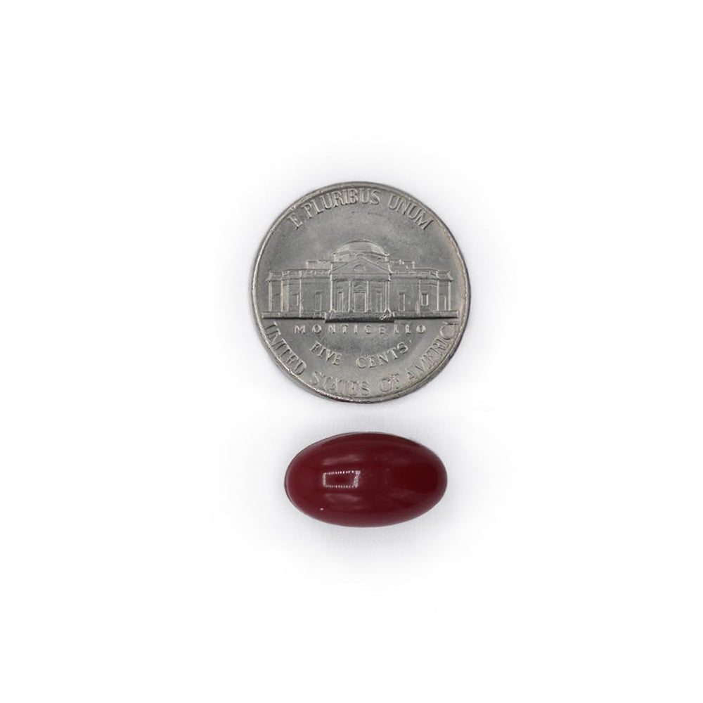 Nutra Nutrition Cranberry Pills softgels being poured into a hand