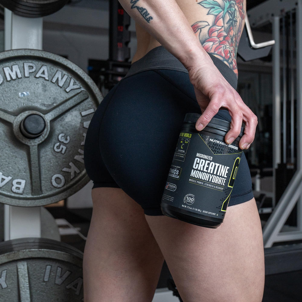 NutraBio Creatine powder in shaker bottle, convenient for on-the-go fueling.