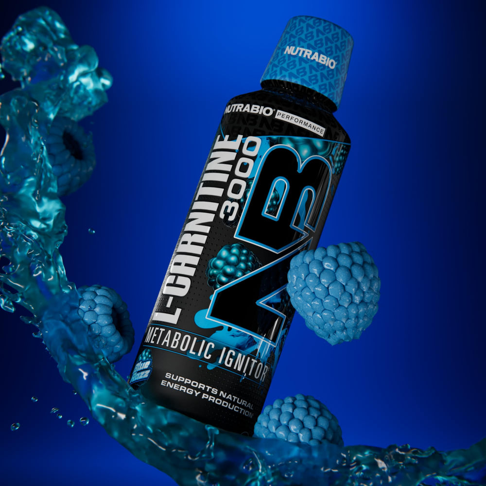 NutraBio L-Carnitine Liquid Shots being poured to illustrate quick absorption benefits.