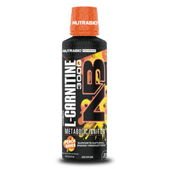 NutraBio L-Carnitine Liquid Shots bottle pouring, 3000mg dose for quick energy support.