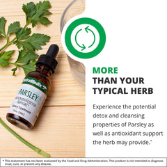 NutraMedix Parsley dropper releasing drops into a cup for daily immune health support.