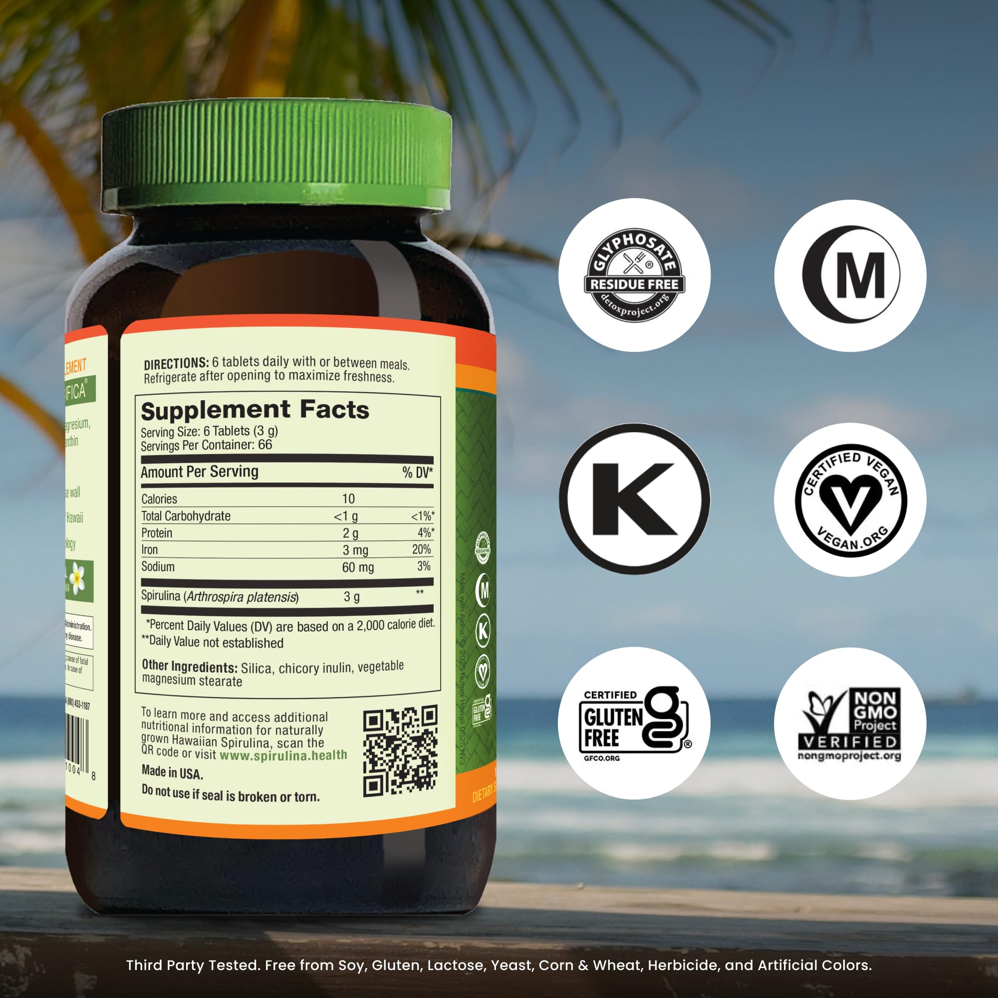 Nutrex Hawaii spirulina tablets close-up highlighting protein-rich vegan support.