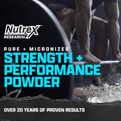 Creatine monohydrate mixed with water in a glass.