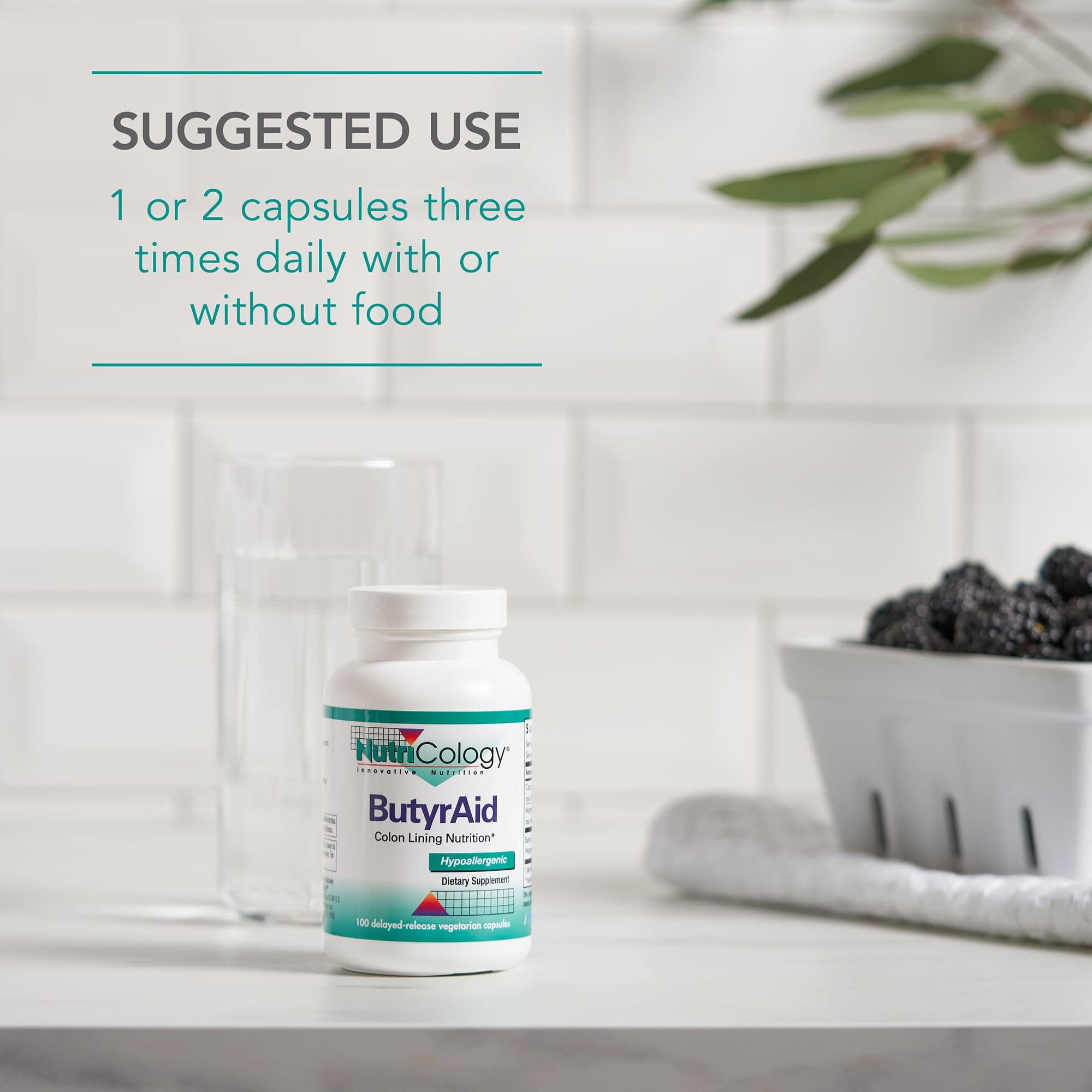 Nutricology ButyrAid capsules in use on a bright table setting.
