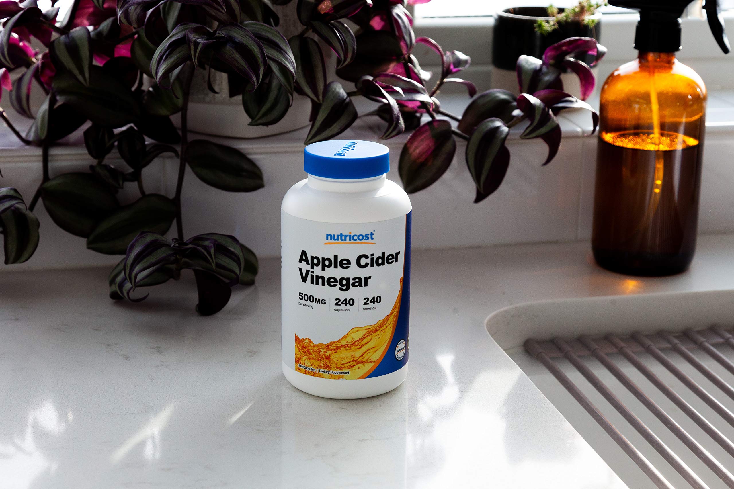 Nutricost Apple Cider Vinegar Capsules open bottle for easy ingestion.