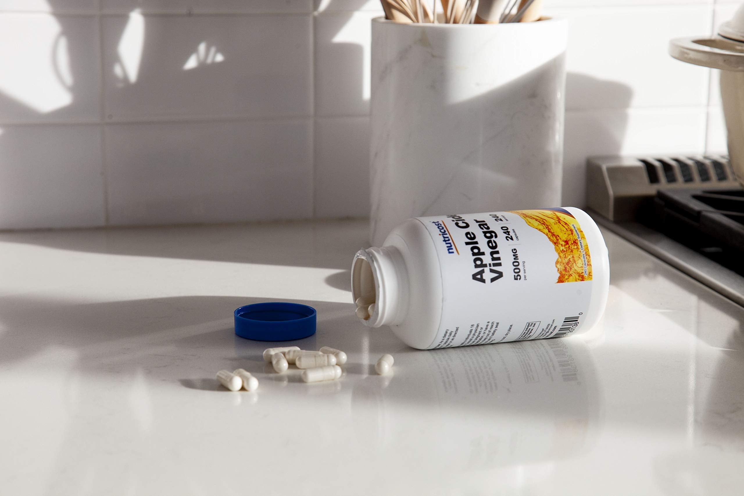 Nutricost ACV Capsules non-GMO and gluten-free on the label.