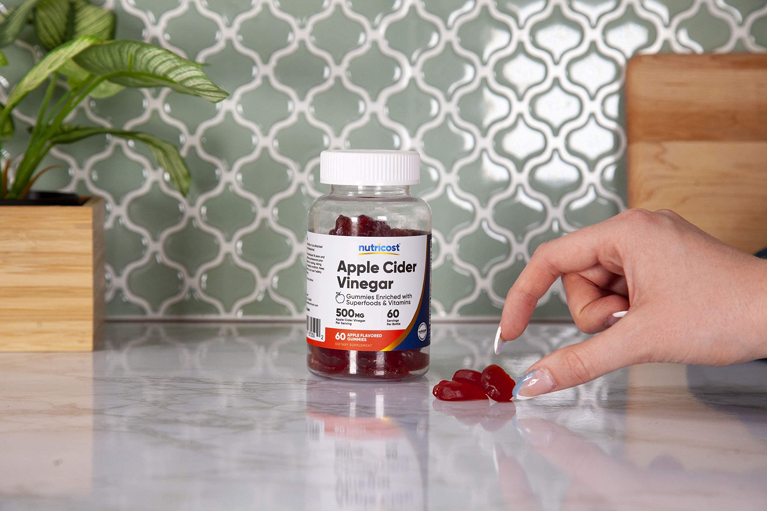 GMP compliant, FDA registered facility symbol near product image.
